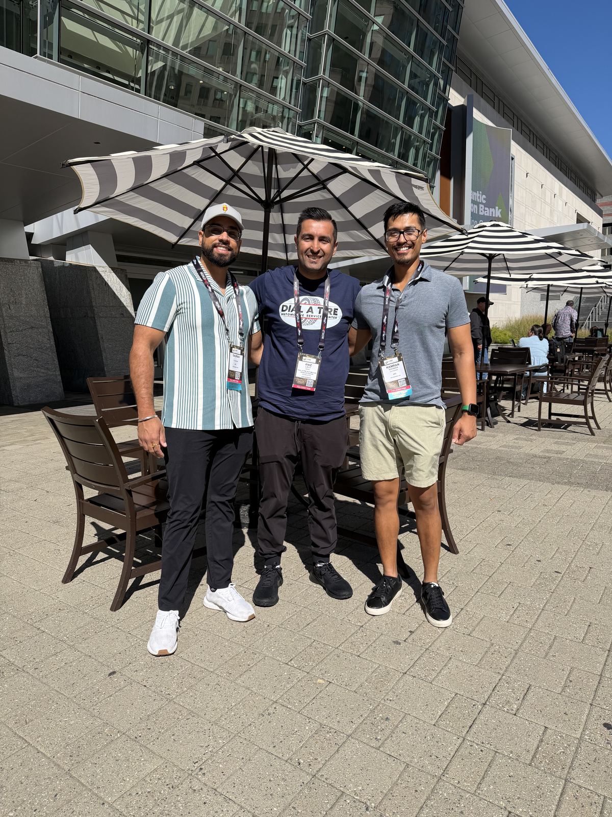 Saurav Kumar, Aniz Lavji, and Kamran Rahman outside the convention center at ASTA Expo 2026 in Raleigh, North Carolina.